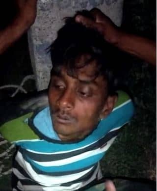 पुलिस की गिरफ्त से भागा चोर लगा पब्लिक के हाथ, बिजली के खंभे में बांध कर जमकर हुई धुनाई