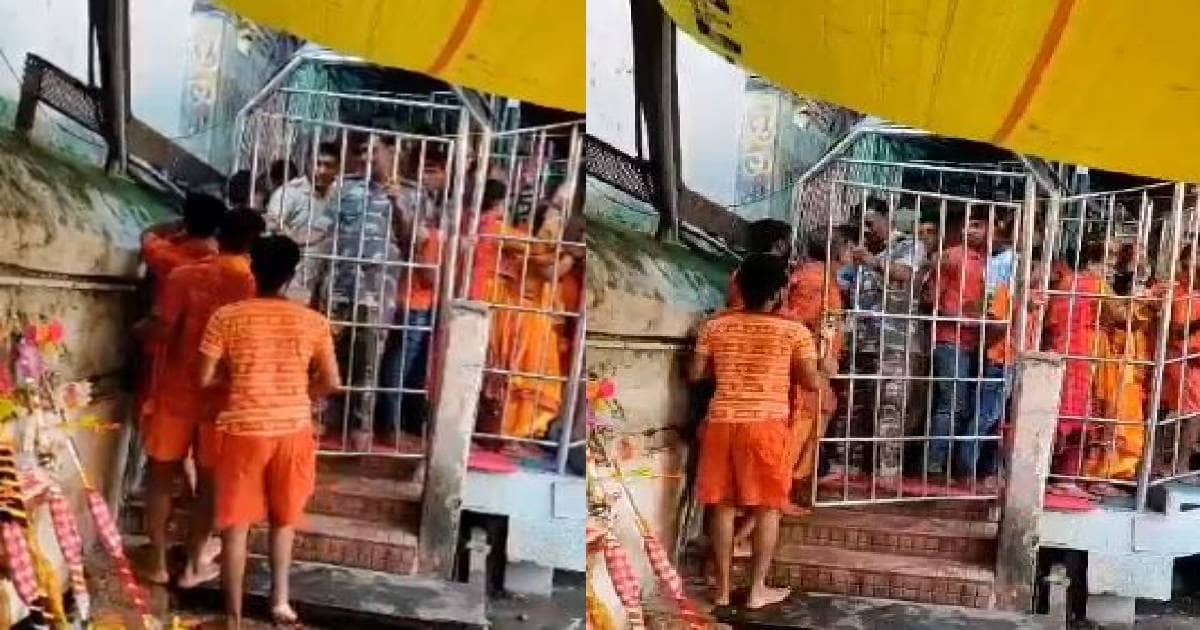 देवघर: श्रद्धालुओं को आपातकालीन गेट से प्रवेश दे रहे थे ASI उग्रीव पासवान, वीडियो वायरल होने पर अधिकारी निलंबित 