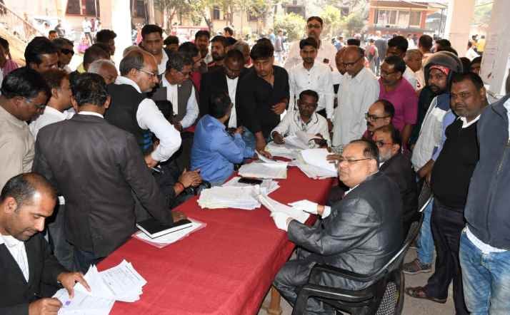 धनबाद में हुआ नेशनल लोक अदालत का उद्घाटन, कोर्ट के चक्कर लगाने से लोगों को मिलेगा निजात