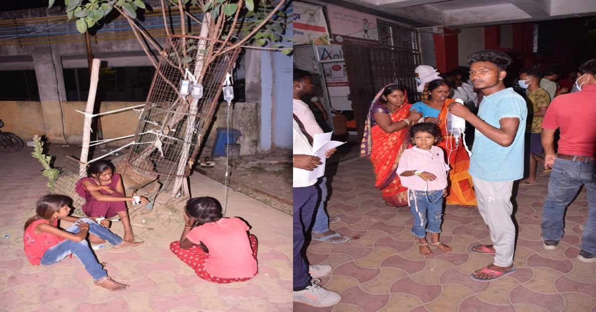 एक साथ सौ मरीज पहुंचे तो धनबाद के SNMMCH में मची अफरा-तफरी,पेड़ पौधों पर स्लाइन टांगकर जानिए कैसे होने लगा इलाज